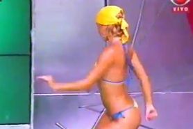 cute brazilian girl dancing in a bikini