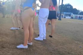 Sexy brunette's round ass on candid footage