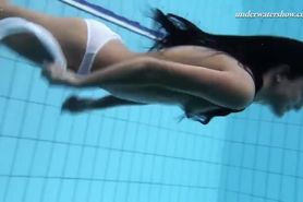 Underwater swimming stripping girl Zhanetta