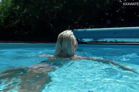 Beautiful blonde Zazie Skymm swims nude
