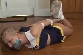 blonde cheerleader hogtied and duct tape gagged