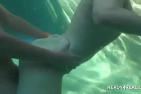 Redhead hottie having underwater sex for cash