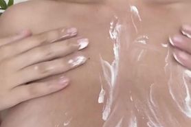 MG rubbing big boobs with cream.  NO NAMES PLEASE