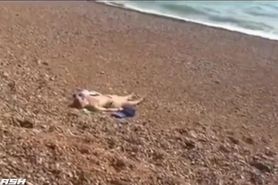 Found teen asleep topless on uK beach