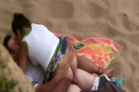 Chubby girl rides boyfriends dick in beach