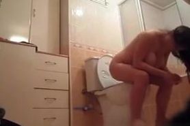 Huge natural boobs caught in bathroom