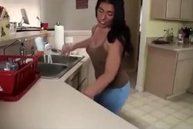 Latina housewife pisses in her pants while washing dishes