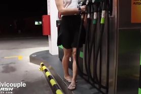 Miss_Livi undressing while pumping gas