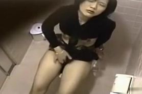 Japanese amateur caught masturbating on the toilet