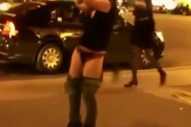 Drunk girl stripping in front of a club