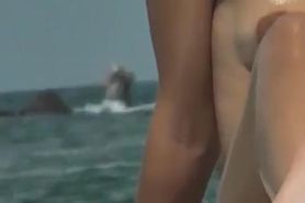 Sexy girl topless at the beach