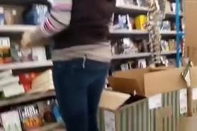 Supermarket woman in tight jeans