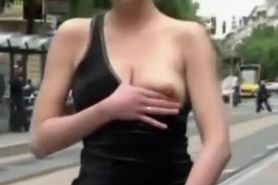 Redhead masturbates on the public street in Europe
