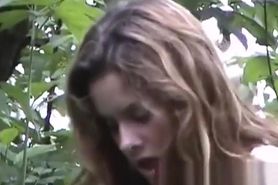 British big hanging tits in the forest outdoors hiding from the public
