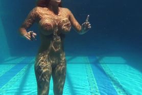 Canadian pornstar Heidi masturbates by the pool