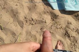 Jerked cock and came on a woman sunbathing on a wild beach