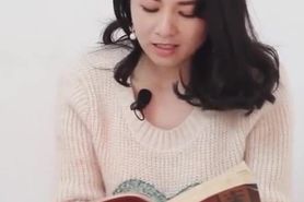 Asian girl reading