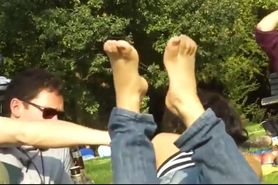 Candid feet in park