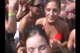 Horny crowd watches cutie flash big titties at beach party