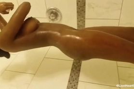 Ebony slut in the shower and butt plug
