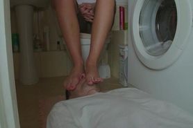 Human Footstool Sylwia's feet in bathroom
