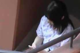 Texting on stairs has earned herself a boob sharking place
