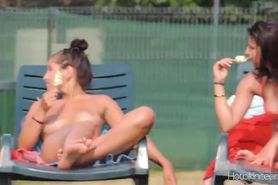 Topless babes are secretly filmed while they tan