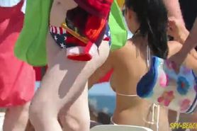Girl sunbathe topless but voyeur films boobs