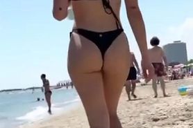 short_ following two beautiful asses at the beach