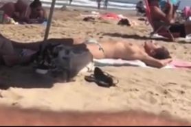Spy On topless spanish girl on beach. Comment pls.