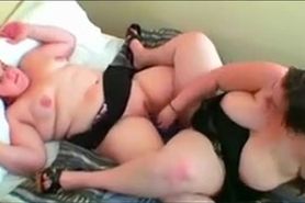 two nasty huge chubby lesbos playing with their raw vulvas