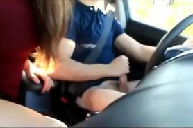 Sexy girl giving her guy a blowjob while he drives