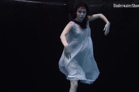 Aqua girl Andrejka underwater stripping and swimming
