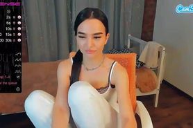 sporty Asian camgirl strips nude and short dildo blowjob