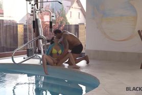 BLACK4K. Raven-haired belle blacked by muscular coach near the pool