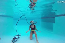 A perfect brunette girl Katya Nakolkina underwater