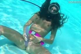 Underwater self sex with purple dildo by Nora Shmandora