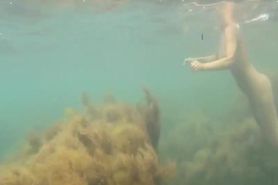 naked woman underwater