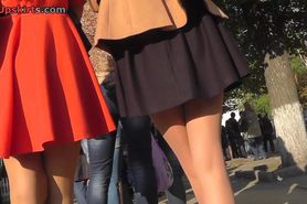 Cute upskirt beauties have a fun a sunny day