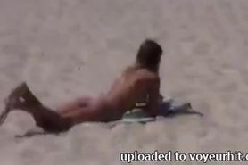 Nudist girl not shy about posing nude at the beach
