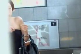 Stylish Asian darling flashes her boobies when her top gets pulled down