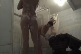 Shower cam spying fem rubbing her back with soap