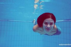 Sexy tight teen Marusia swims naked underwater