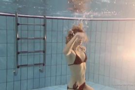 Nastya hot blonde naked in the pool