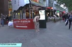 Naughty naked girl has fun on public streets