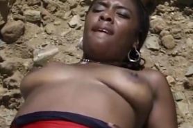 Hot Ebony slut enjoys some big black cock on the beach