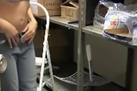 Coworker changing in the storage room