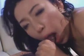 Sexy Asian in black dress gobbles dick and gets pounded hard!