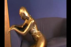 Blonde girl in golden spandex (clip)
