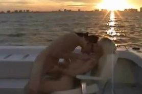 2 sexy lesbos making out on a boat